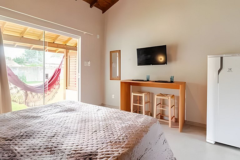 Studio Deluxe Varanda | 5 min da Praia do Rosa